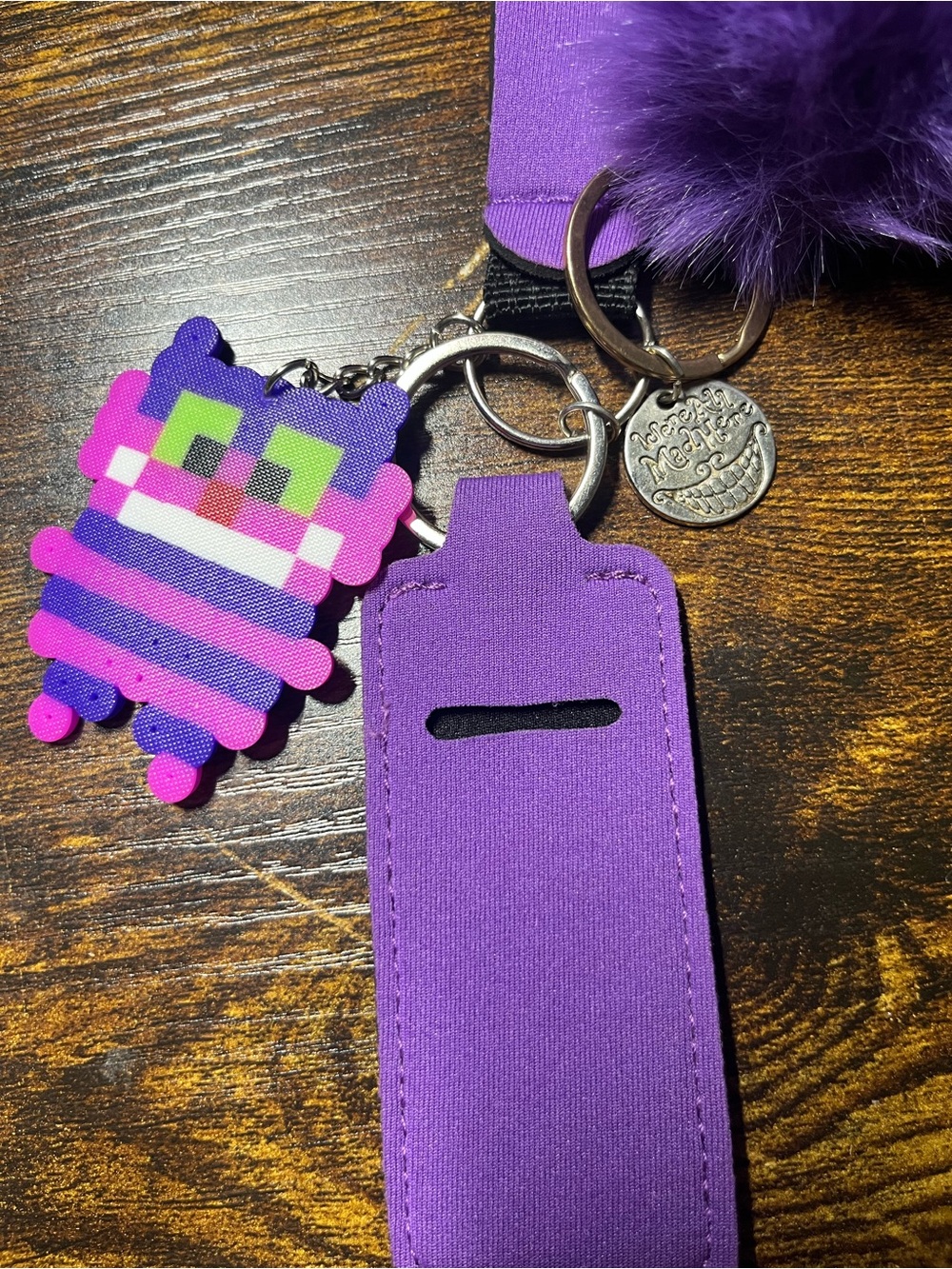 Purple Cheshire Cat Wrist Strap Keychain with Pom and Character Charm